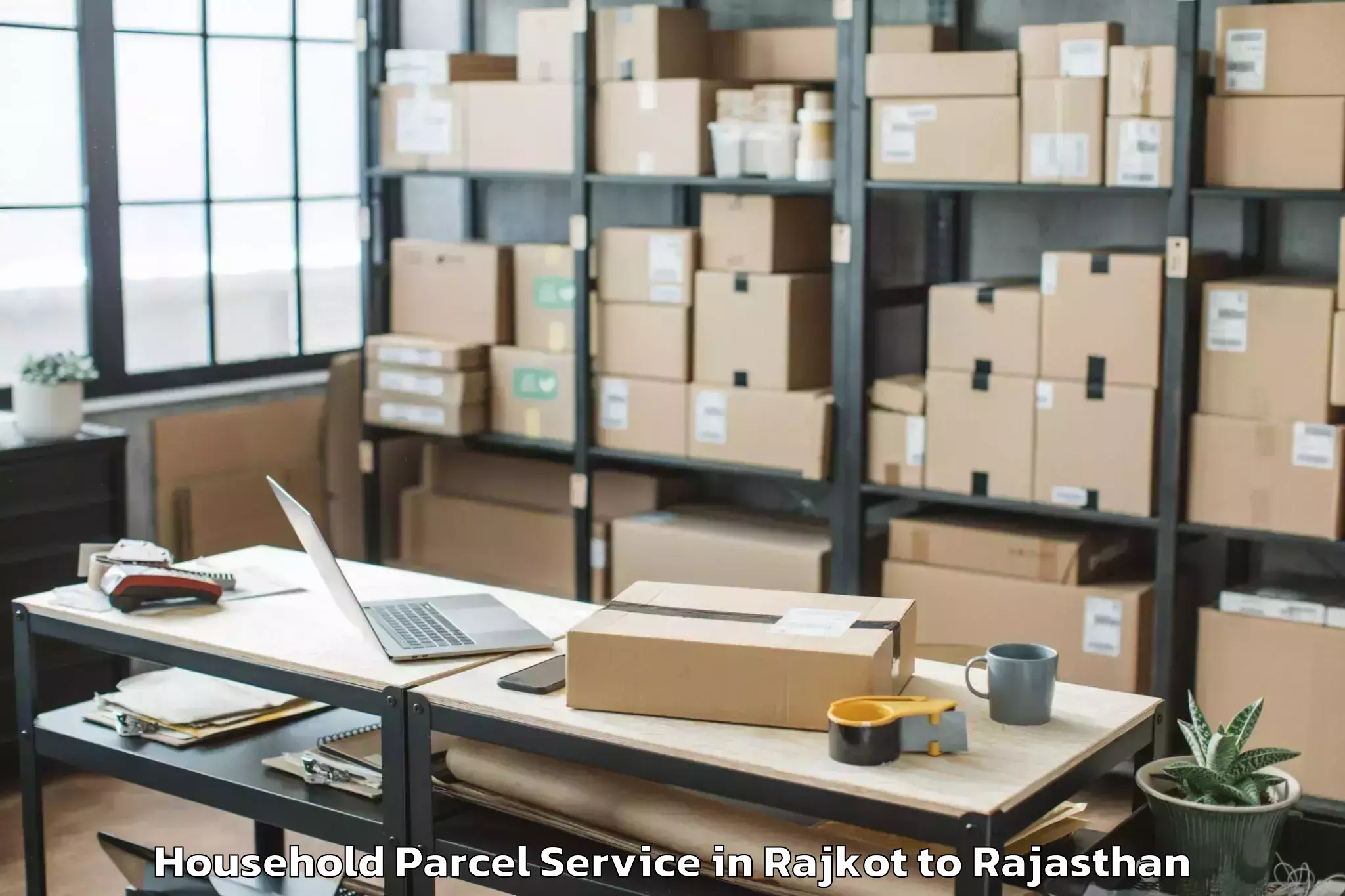 Easy Rajkot to Chauth Ka Barwara Household Parcel Booking